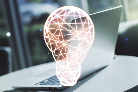 Creative light bulb illustration on modern computer background, future technology concept. Multiexposureの写真素材