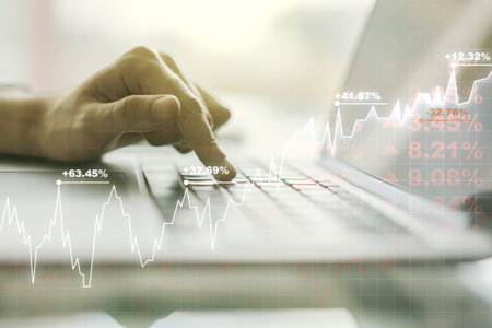 Multi exposure of abstract financial diagram with hand typing on computer keyboard on background,...