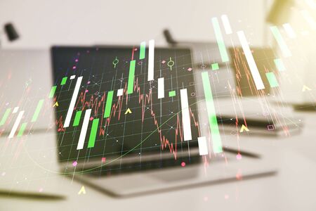 Multi exposure of abstract creative financial chart on computer background, research and analytics conceptの写真素材