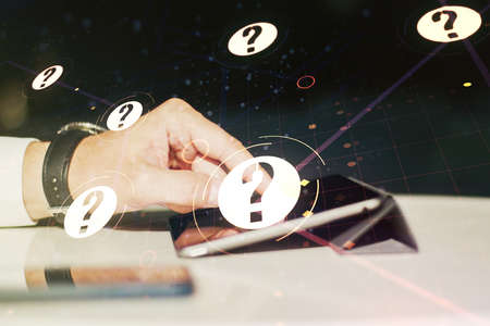 Creative abstract question mark hologram and finger presses on a digital tablet on background, future technology concept. Multi exposureの写真素材