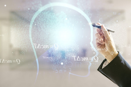 Man hand with pen working with abstract virtual artificial Intelligence concept with human head...