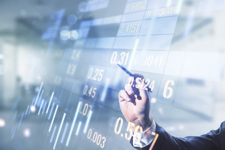 Multi exposure of businessman hand with pen working with virtual creative financial chart hologram...