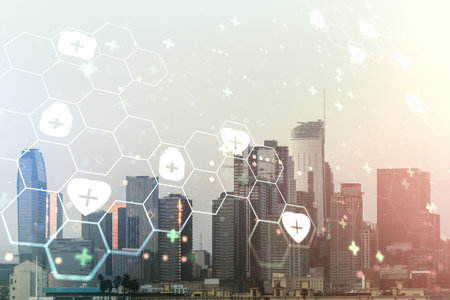 Double exposure of abstract virtual medical hologram on Los Angeles city skyscrapers background....
