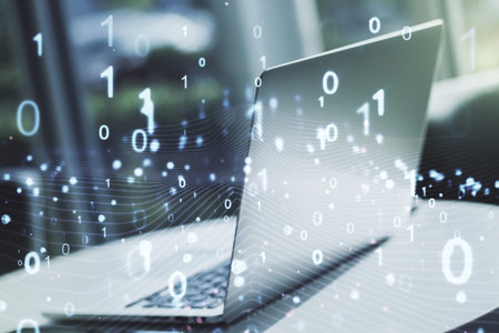 Creative concept of binary code illustration on modern laptop background. Big data and coding...