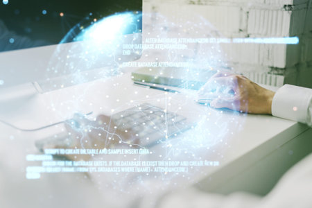 Abstract creative coding concept with world map and hands typing on laptop on background....