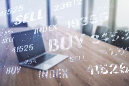 Abstract creative financial graph on modern laptop background, forex and investment concept. Multiexposureの写真素材