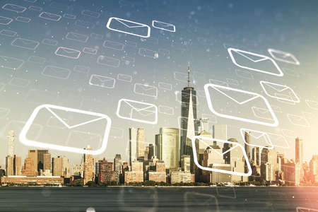 Abstract virtual postal envelopes sketch on Manhattan office buildings background, e-mail and marketing concept. Double exposureの写真素材