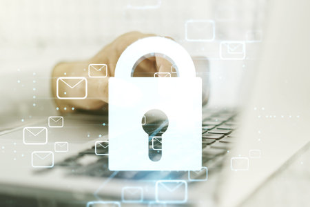 Creative concept with lock symbol and postal envelopes illustration and with hands typing on laptop...