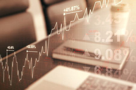 Abstract creative financial graph on modern laptop background, forex and investment concept....