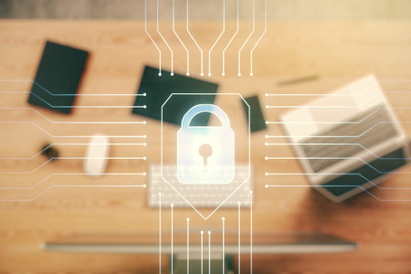 Double exposure of creative lock hologram with chip on laptop background. Information security...