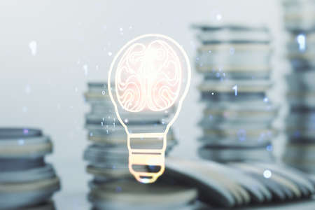 Abstract virtual creative light bulb with human brain hologram on growing coins stacks background, artificial Intelligence and neural networks concept. Multiexposureの写真素材
