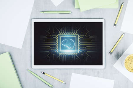 Creative artificial Intelligence concept with human brain hologram on modern digital tablet screen. Top view. 3D Renderingの写真素材