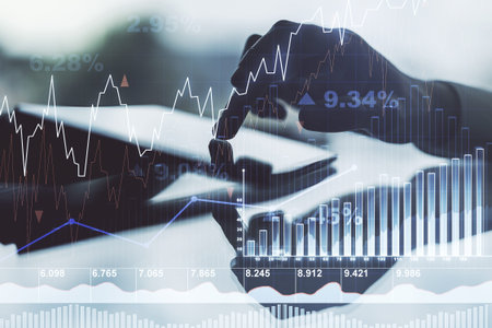 Multi exposure of abstract financial diagram and hand working with a digital tablet on background,...