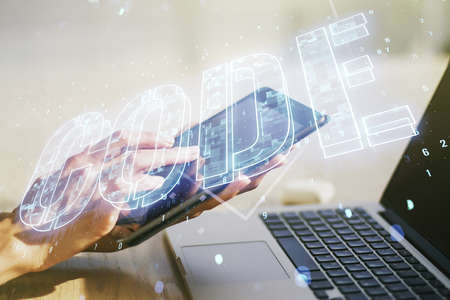 Creative Code word sign and finger clicks on a digital tablet on background, international software development concept. Multiexposureの写真素材
