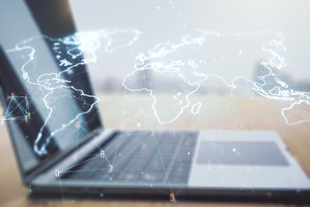 Double exposure of abstract digital world map on laptop background, research and strategy concept
