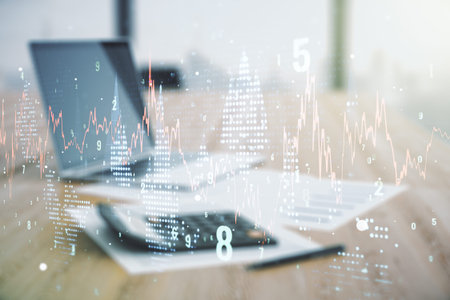 Abstract virtual financial graph hologram on blurry calculator and computer background, financial...