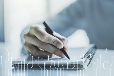 Creative concept of microscheme illustration and man hand writing in notebook on background. Big...