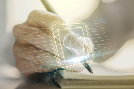 Creative artificial Intelligence concept with human brain sketch and woman hand writing in diary on...
