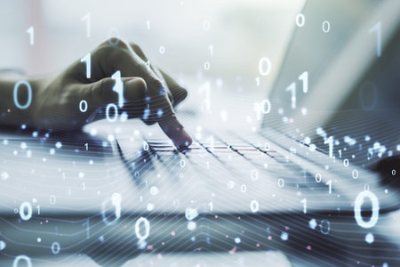 Creative concept of binary code illustration and hands typing on laptop on background. Big data and...