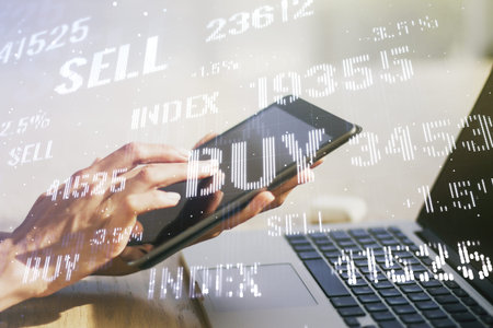 Abstract creative financial graph with finger clicks on a digital tablet on background, financial...