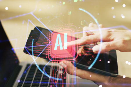 Double exposure of creative artificial Intelligence abbreviation and hand working with a digital...