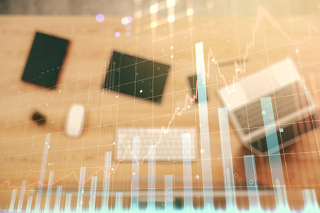 Multi exposure of abstract financial graph on laptop background, financial and trading concept