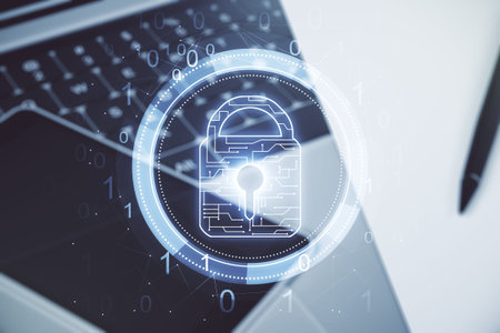 Double exposure of creative lock hologram with chip on laptop background. Information security...