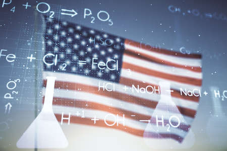 Abstract virtual creative chemistry hologram on USA flag and sunset sky background. Multiexposureの写真素材