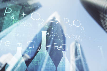 Abstract virtual creative chemistry hologram on office buildings background. Multiexposureの写真素材