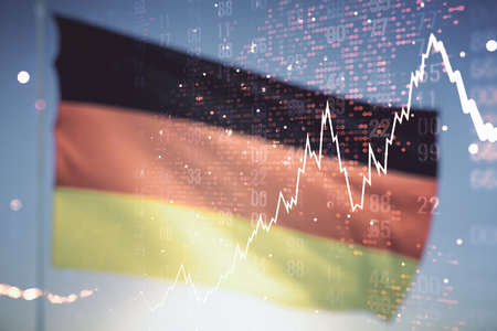 Abstract creative financial graph interface and world map on flag of Germany and sunset sky background, forex and investment concept. Multiexposureの写真素材