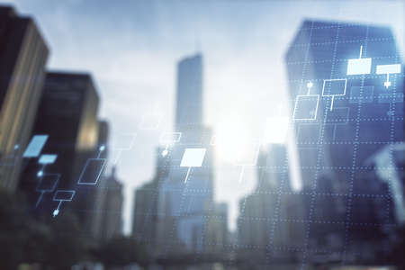 Double exposure of abstract financial graph on office buildings background, forex and investment conceptの写真素材