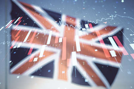 Abstract virtual crisis chart illustration on flag of Great Britain and sunset sky background. Global crisis and bankruptcy concept. Multiexposureの写真素材