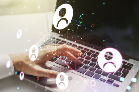 Social network media concept with hands typing on computer keyboard on background. Double exposure
