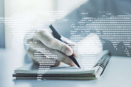 Multi exposure of abstract creative digital world map and man hand writing in notebook on background, tourism and traveling conceptの写真素材