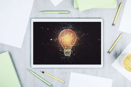 Creative idea concept with light bulb illustration on modern digital tablet screen. Top view. 3D...