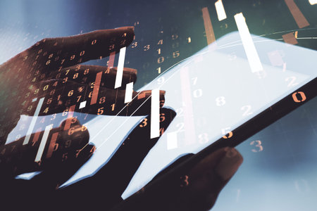 Double exposure of abstract creative financial chart with finger clicks on a digital tablet on...