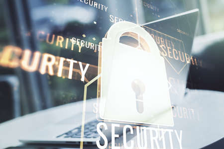 Creative idea concept with lock symbol and microcircuit illustration on modern laptop background. Protection and firewall concept. Multiexposureの写真素材