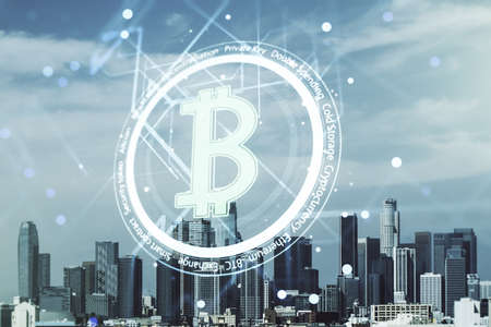 Virtual Bitcoin hologram on Los Angeles skyline background. Multiexposureの写真素材