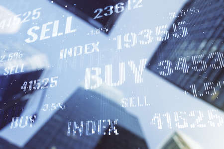 Double exposure of abstract financial graph on office buildings background, financial and trading conceptの写真素材