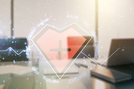Creative abstract heart pulse hologram and modern desktop with pc on background, online medical consulting concept. Multiexposureの写真素材