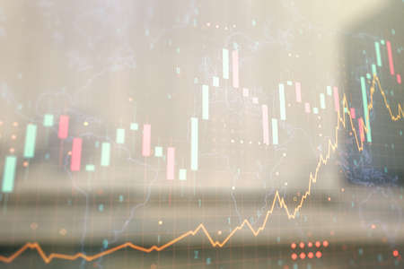 Abstract creative financial graph and world map on blurry contemporary office building background, financial and trading concept. Multiexposureの写真素材