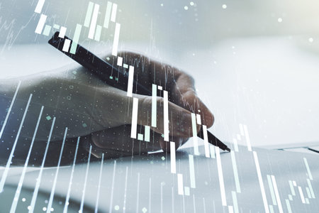 Multi exposure of abstract financial diagram with hand writing in notepad on background, banking and...
