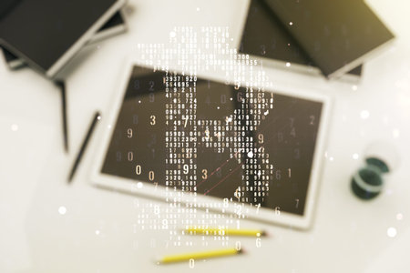 Creative Bitcoin concept and modern digital tablet on background, top view. Multiexposure