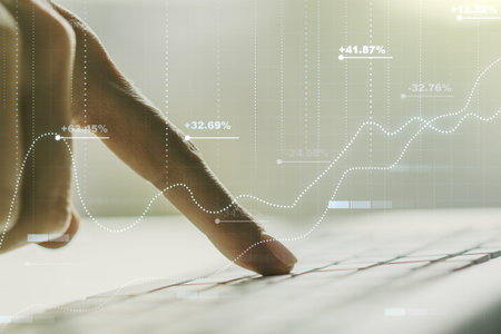 Multi exposure of abstract statistics data hologram interface with hands typing on computer keyboard on background, computing and analytics conceptの写真素材