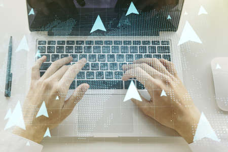 Creative abstract geolocations map sketch and hands typing on computer keyboard on background, GPS tracking and navigation concept. Double exposureの写真素材