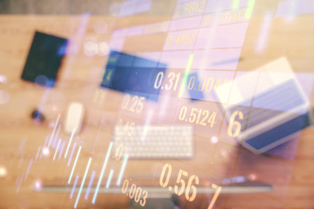 Double exposure of abstract creative financial chart on modern laptop background, research and...
