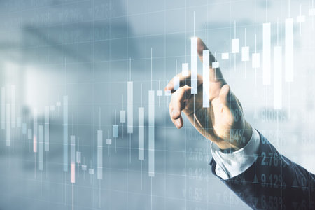 Multi exposure of businessman hand presses on virtual creative financial chart hologram on blurred...