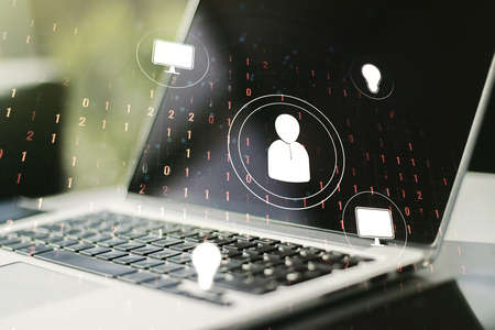 Double exposure of social network icons concept with modern laptop on background. Marketing and promotion conceptの写真素材