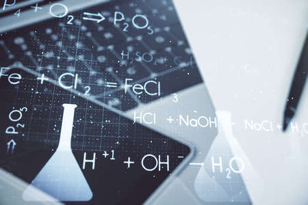 Double exposure of creative chemistry concept on laptop background, research and development conceptの写真素材