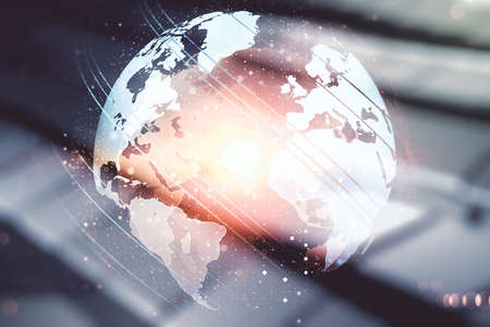 Abstract creative world map interface on blurry abstract metal background, international trading concept. Multiexposureの写真素材